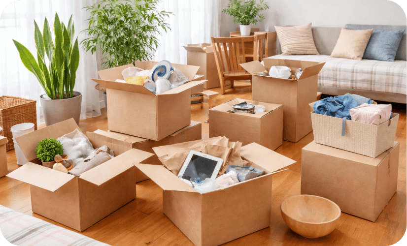 Boxes and household items packed for storage in a home near Mansfield storage sheds