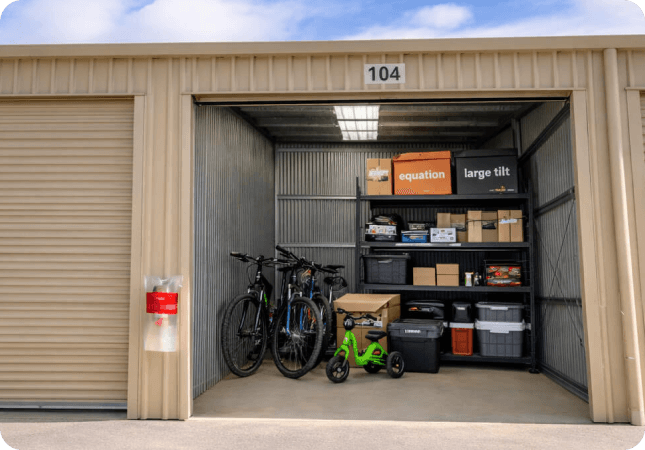 Organised household items and bikes inside personal storage sheds Mansfield
